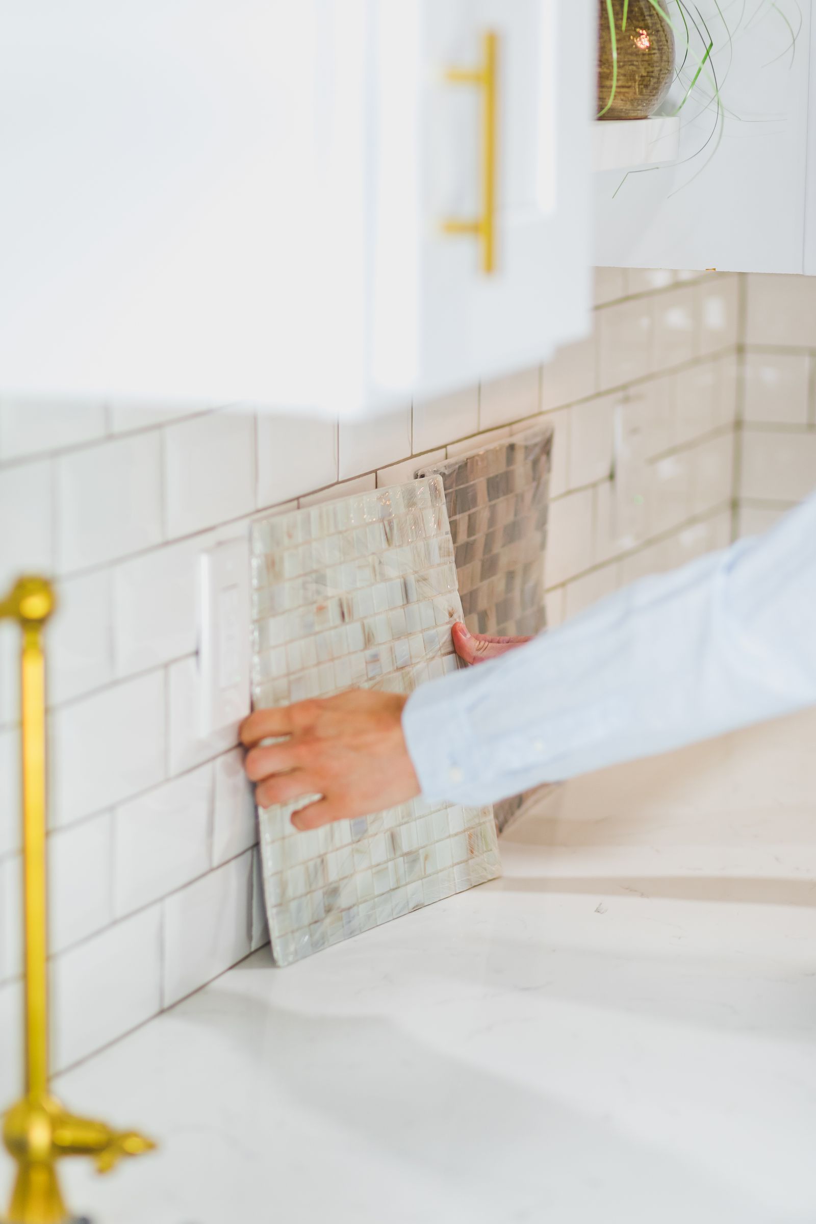 Choosing mosaic tile samples for a kitchen backsplash